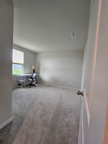 a view of a livingroom and a sink