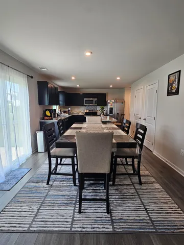 a view of a dining room with furniture