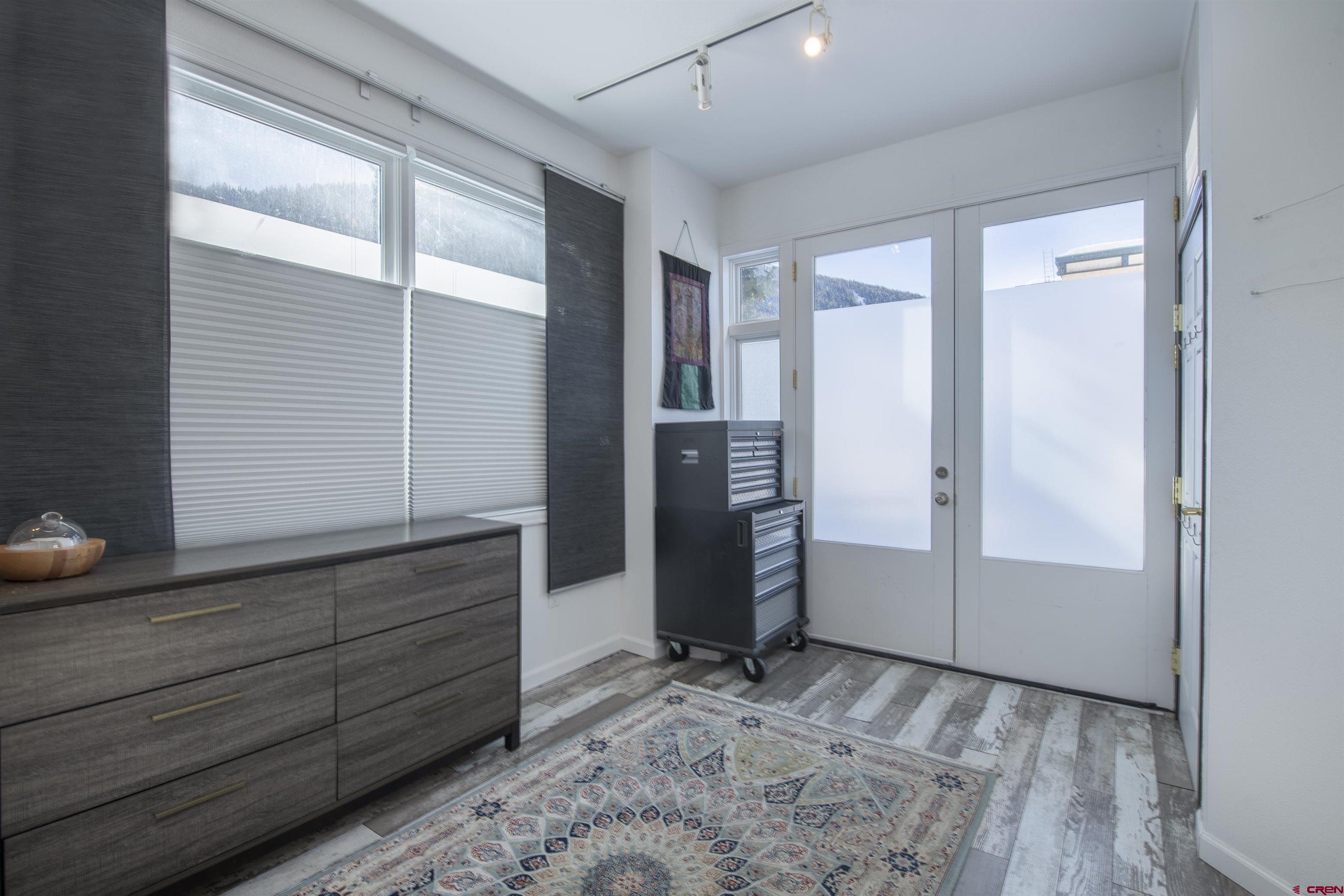 503 Red Lady Avenue, Unit 101 Crested Butte, CO 81224 - Photo 12 of 20 a view of entryway with wooden floor