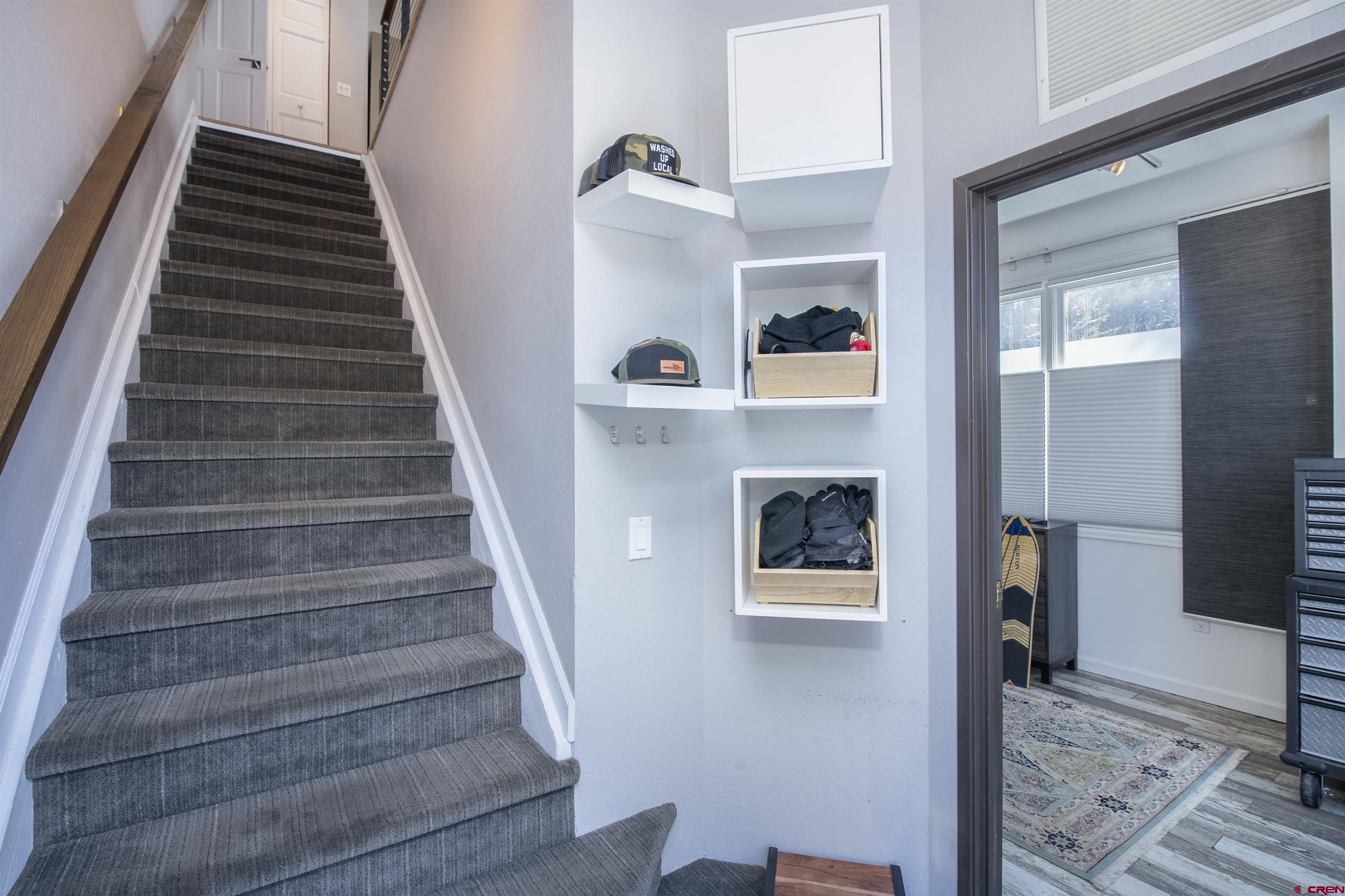 503 Red Lady Avenue, Unit 101 Crested Butte, CO 81224 - Photo 14 of 20 a view of entryway and hall with wooden floor