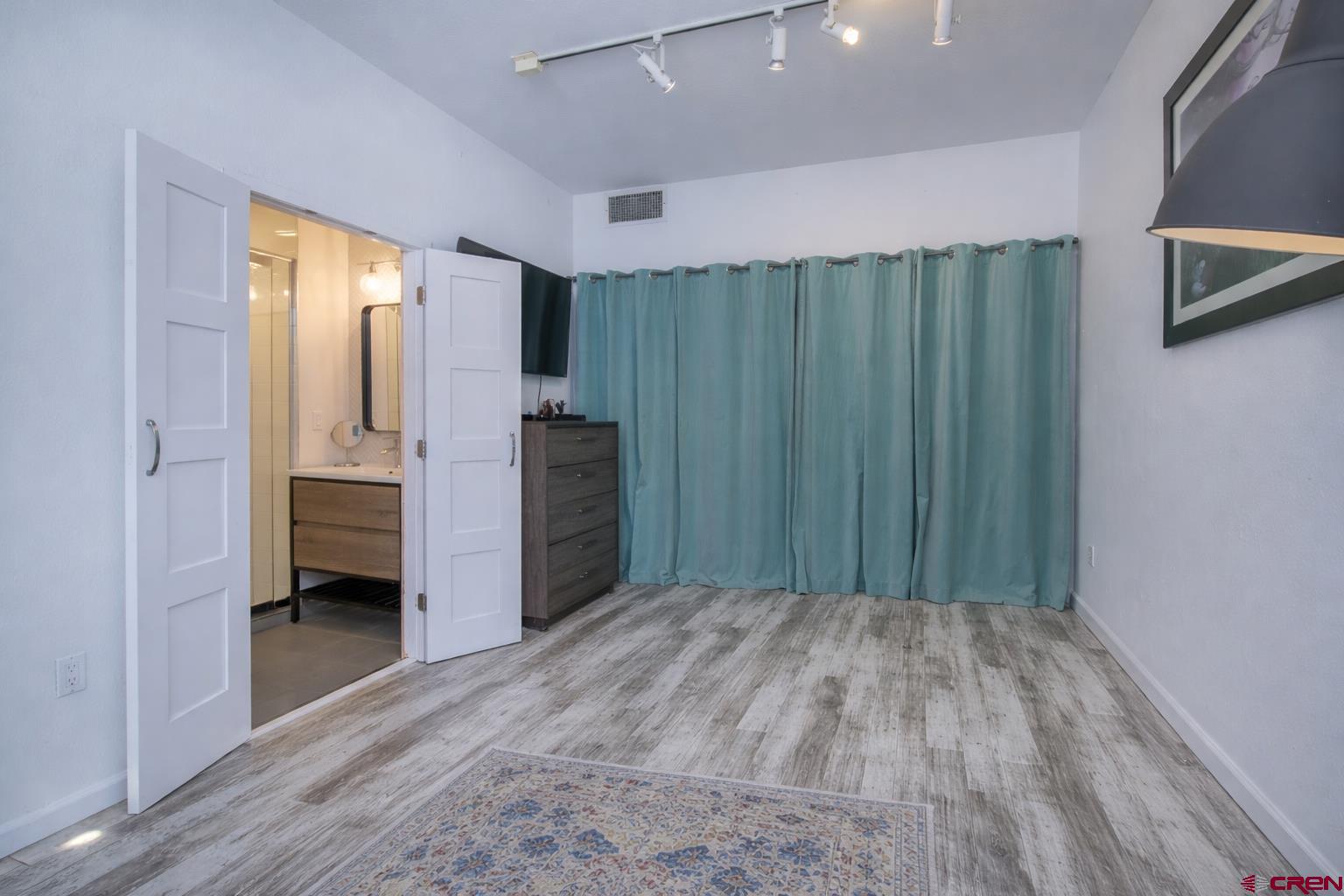 503 Red Lady Avenue, Unit 101 Crested Butte, CO 81224 - Photo 8 of 20 a view of entryway with wooden floor