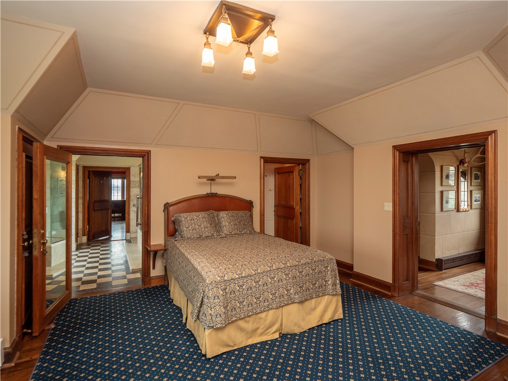 57 Ledge Road, Unit 2 Newport, RI 02840 - Photo 21 of 50 Primary Bedroom view to Primary Bath, Walk-In Closet and to Foyer & Hallway.