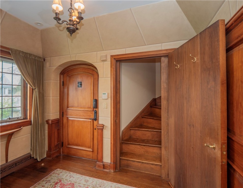 57 Ledge Road, Unit 2 Newport, RI 02840 - Photo 43 of 50 Foyer view to Front Door & Door to Attic Stairway leading to 3rd Level Cedar Closet and Storage area with Expansion Possibilities