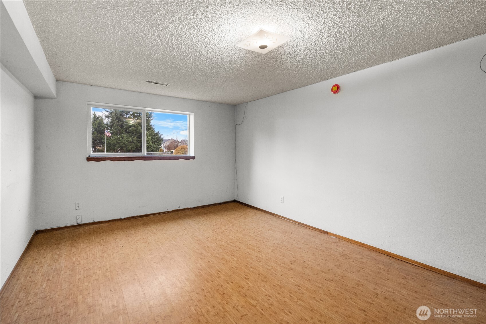 9139 Burnett Road Southeast Yelm, WA 98597 - Photo 26 of 40 an empty room with windows