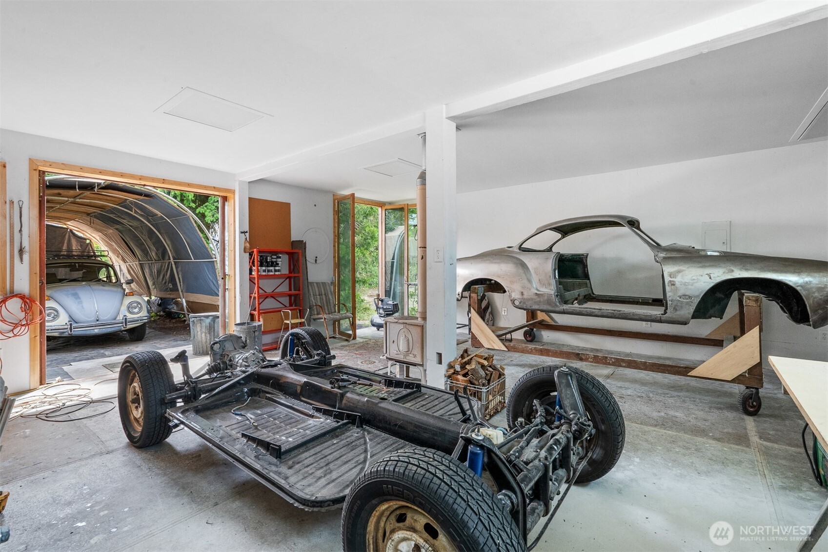 9139 Burnett Road Southeast Yelm, WA 98597 - Photo 33 of 40 a view of car parked in garage