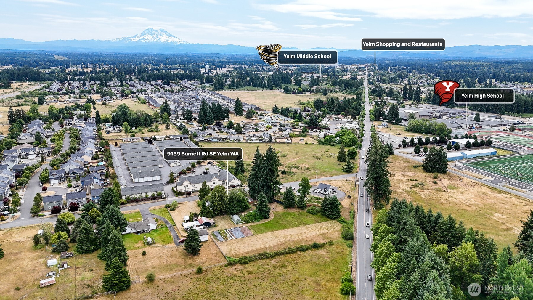 9139 Burnett Road Southeast Yelm, WA 98597 - Photo 6 of 40 an aerial view of a city