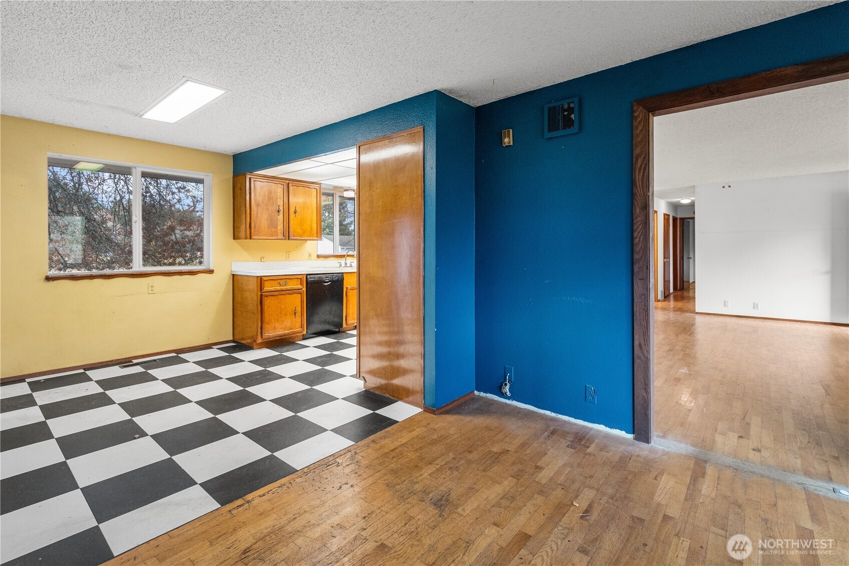 9139 Burnett Road Southeast Yelm, WA 98597 - Photo 9 of 40 a view of a livingroom with wooden floor and a window
