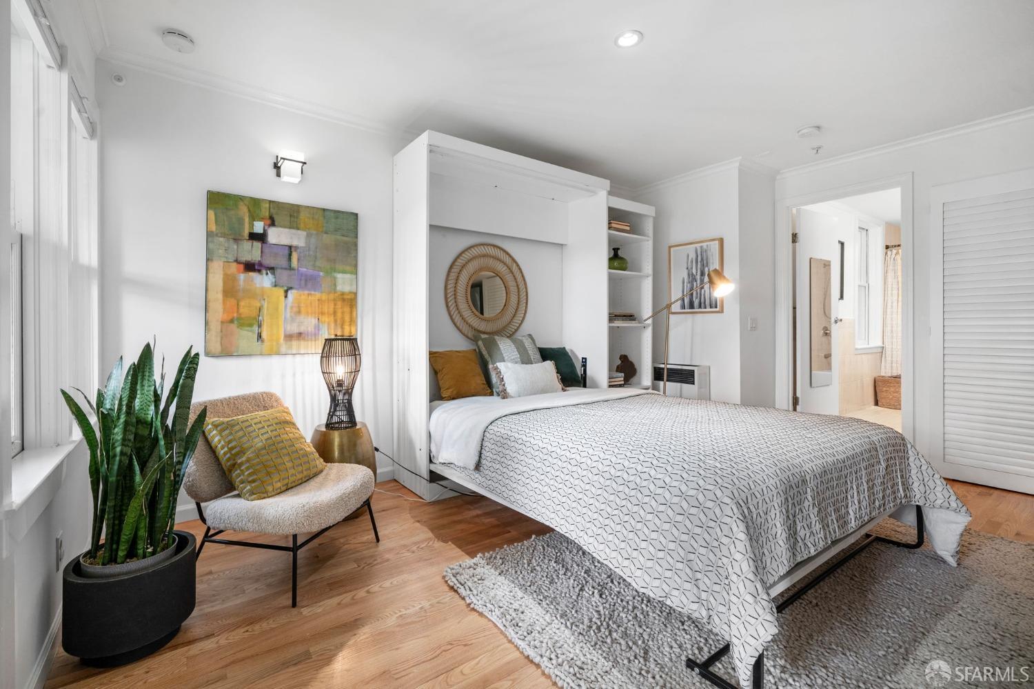 333 Cherry Street, Unit B San Francisco, CA 94118 - Photo 21 of 34 a bedroom with bed and wooden floor