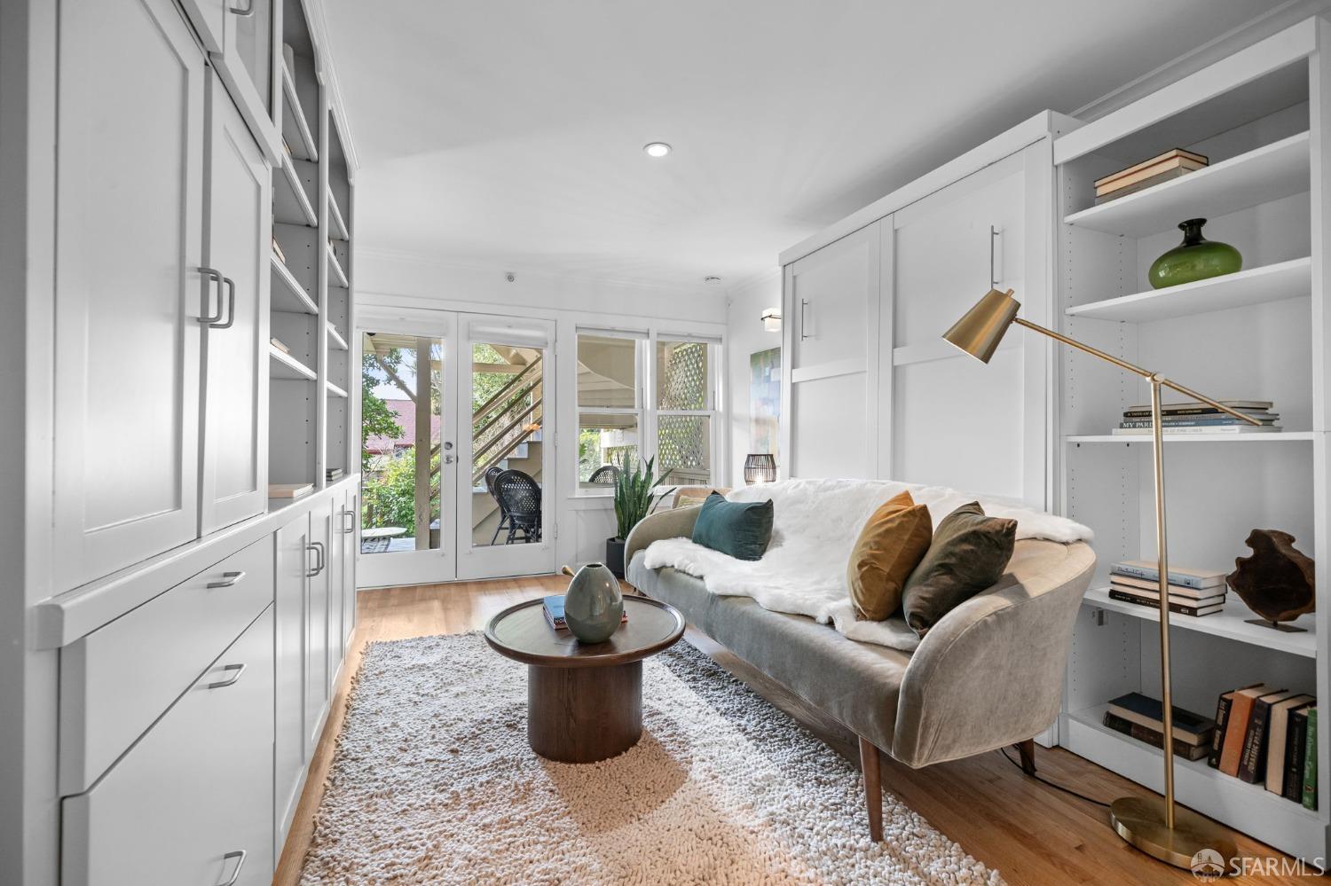 333 Cherry Street, Unit B San Francisco, CA 94118 - Photo 22 of 34 a living room with furniture and a book shelf