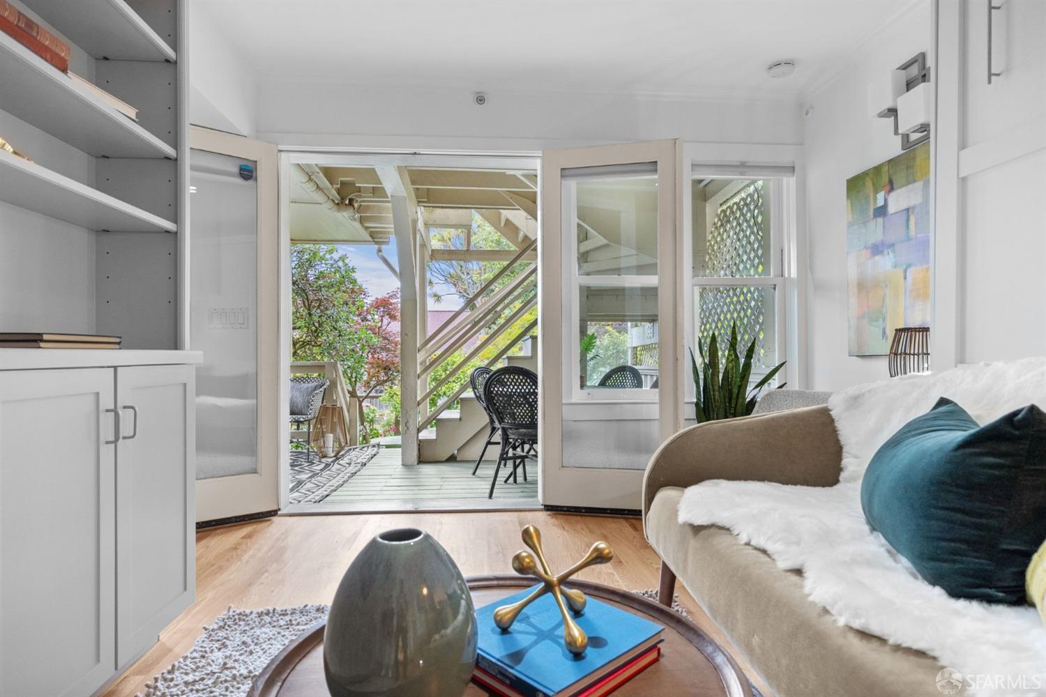 333 Cherry Street, Unit B San Francisco, CA 94118 - Photo 4 of 34 a living room with furniture and a large window