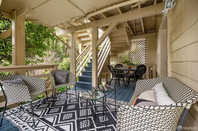 a view of balcony with wooden floor