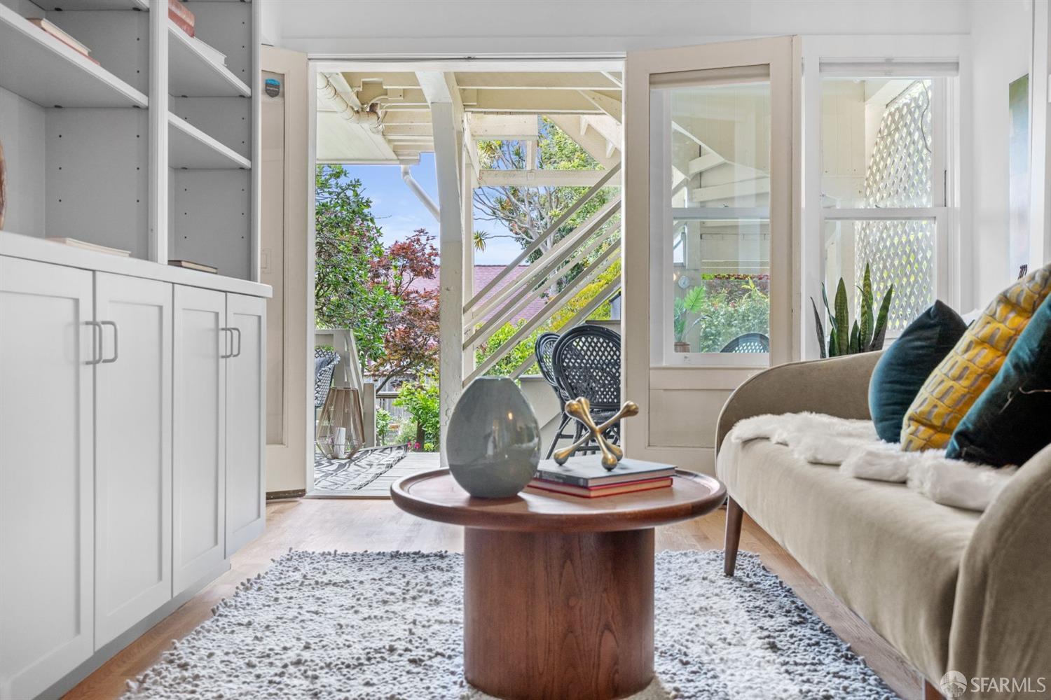 333 Cherry Street, Unit B San Francisco, CA 94118 - Photo 10 of 34 a living room with furniture and a window