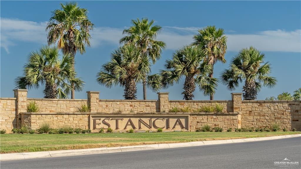 a view of a swimming pool with a garden