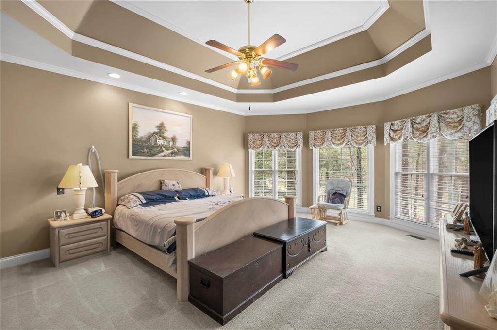 5870 Brookstone Walk Northwest Acworth, GA 30101 - Photo 21 of 79 a bedroom with a bed and a large window