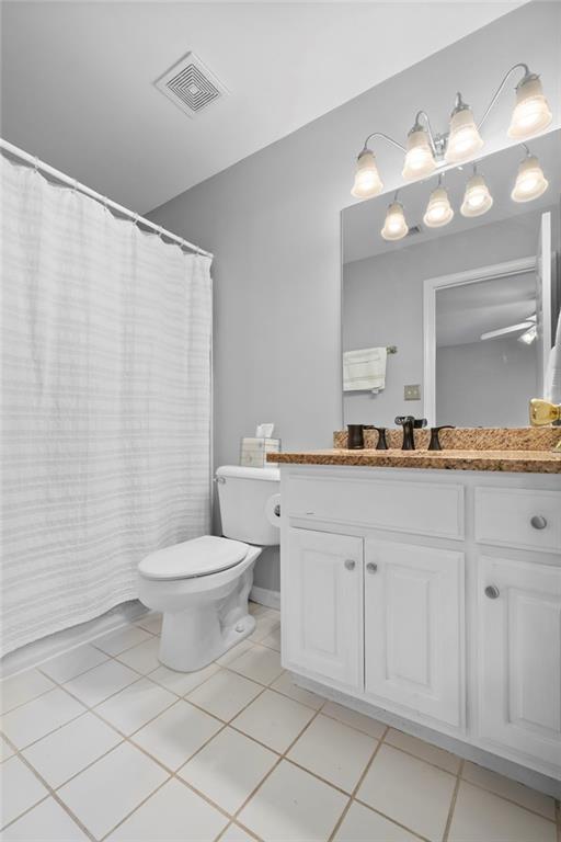 5870 Brookstone Walk Northwest Acworth, GA 30101 - Photo 31 of 79 a bathroom with a toilet a sink and mirror