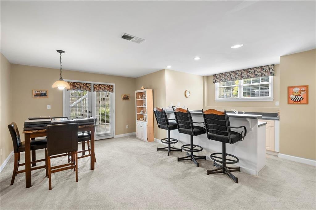 5870 Brookstone Walk Northwest Acworth, GA 30101 - Photo 38 of 79 a view of a workspace with furniture and a window
