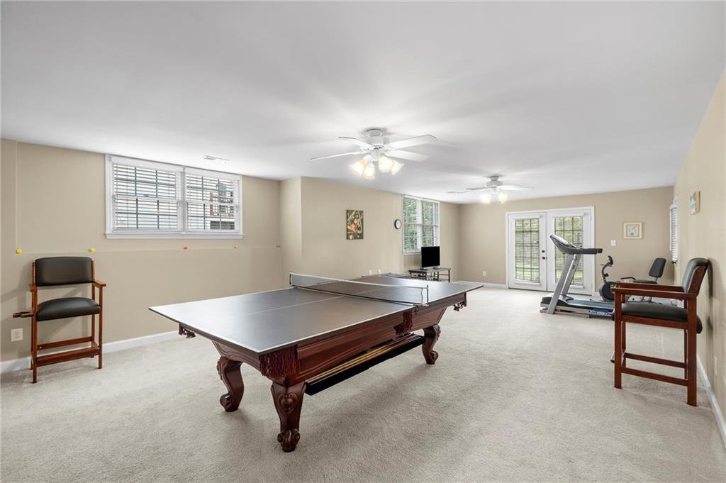 5870 Brookstone Walk Northwest Acworth, GA 30101 - Photo 42 of 79 a living room with furniture pool table and window
