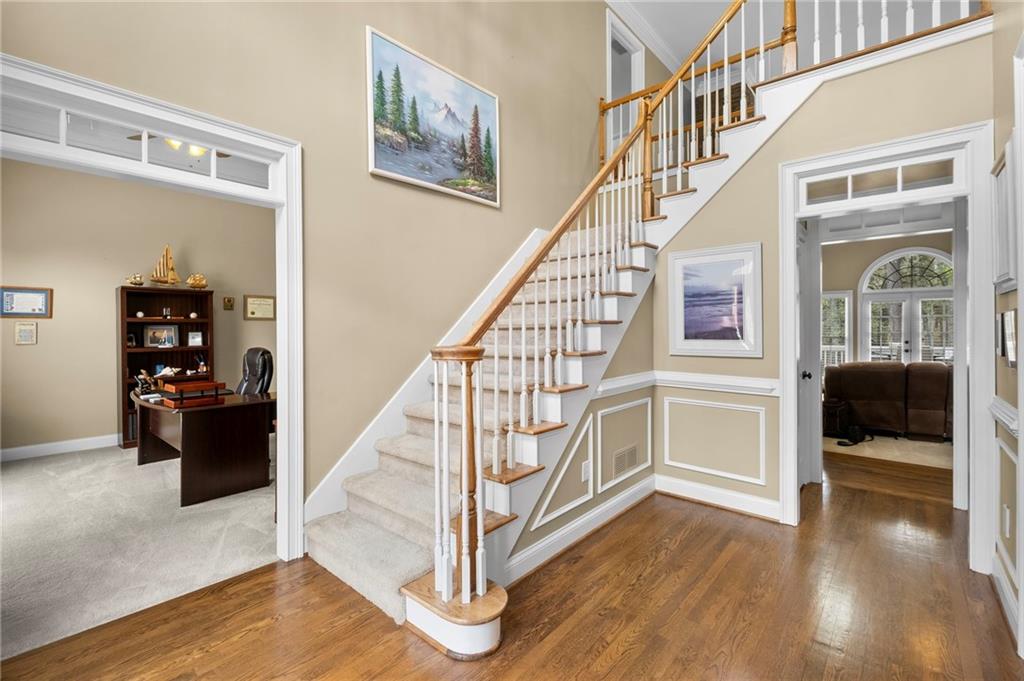 5870 Brookstone Walk Northwest Acworth, GA 30101 - Photo 6 of 79 a view of entryway and hall with wooden floor