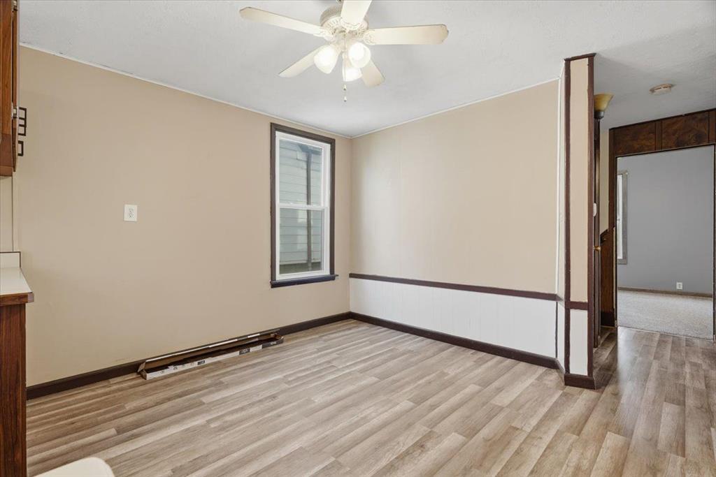 15 Division Street Pittsburgh, PA 15205 - Photo 22 of 44 a view of an empty room with wooden floor and a window