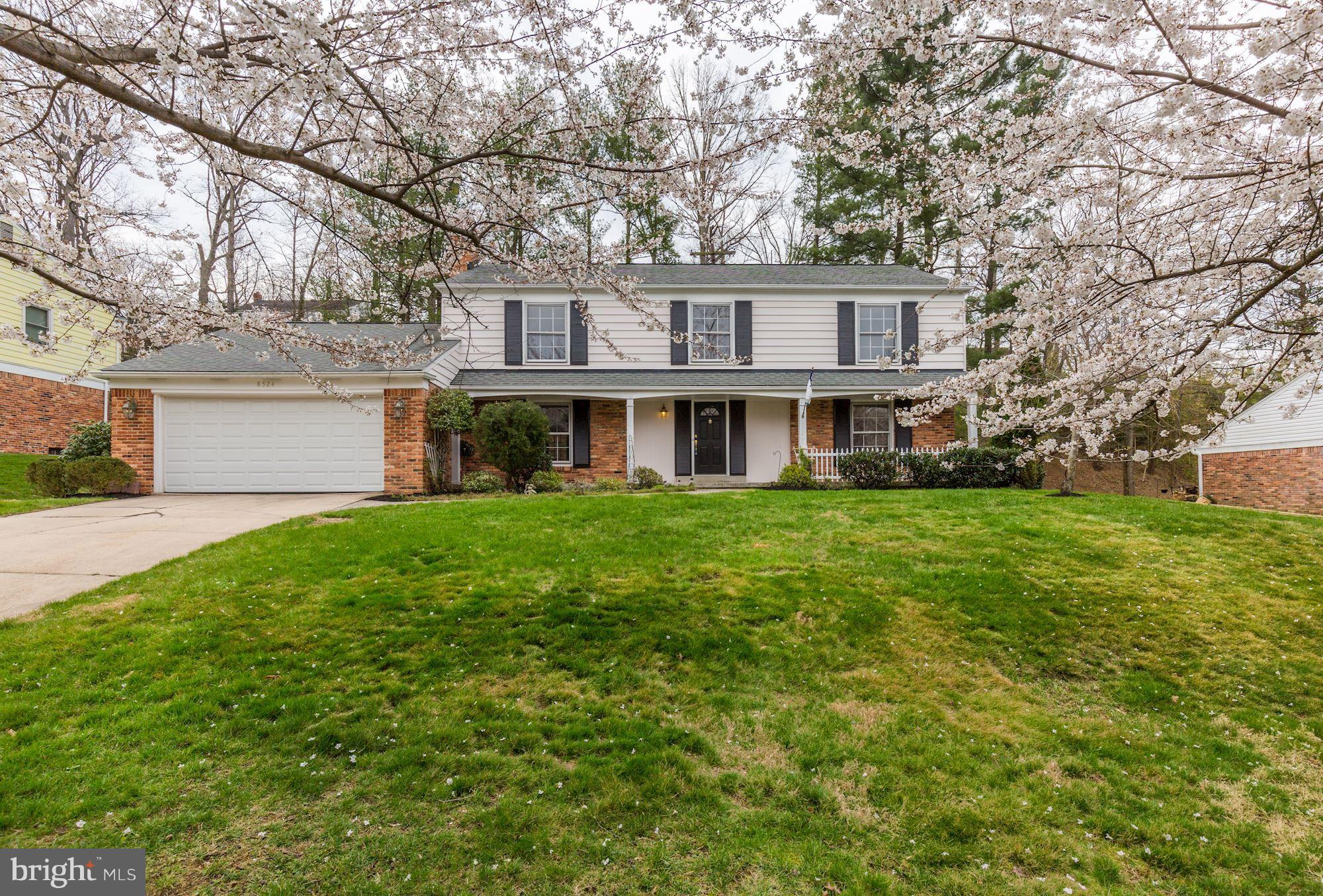 8524 Fox Run Potomac, MD 20854 - Photo 2 of 30 a front view of house with yard and green space