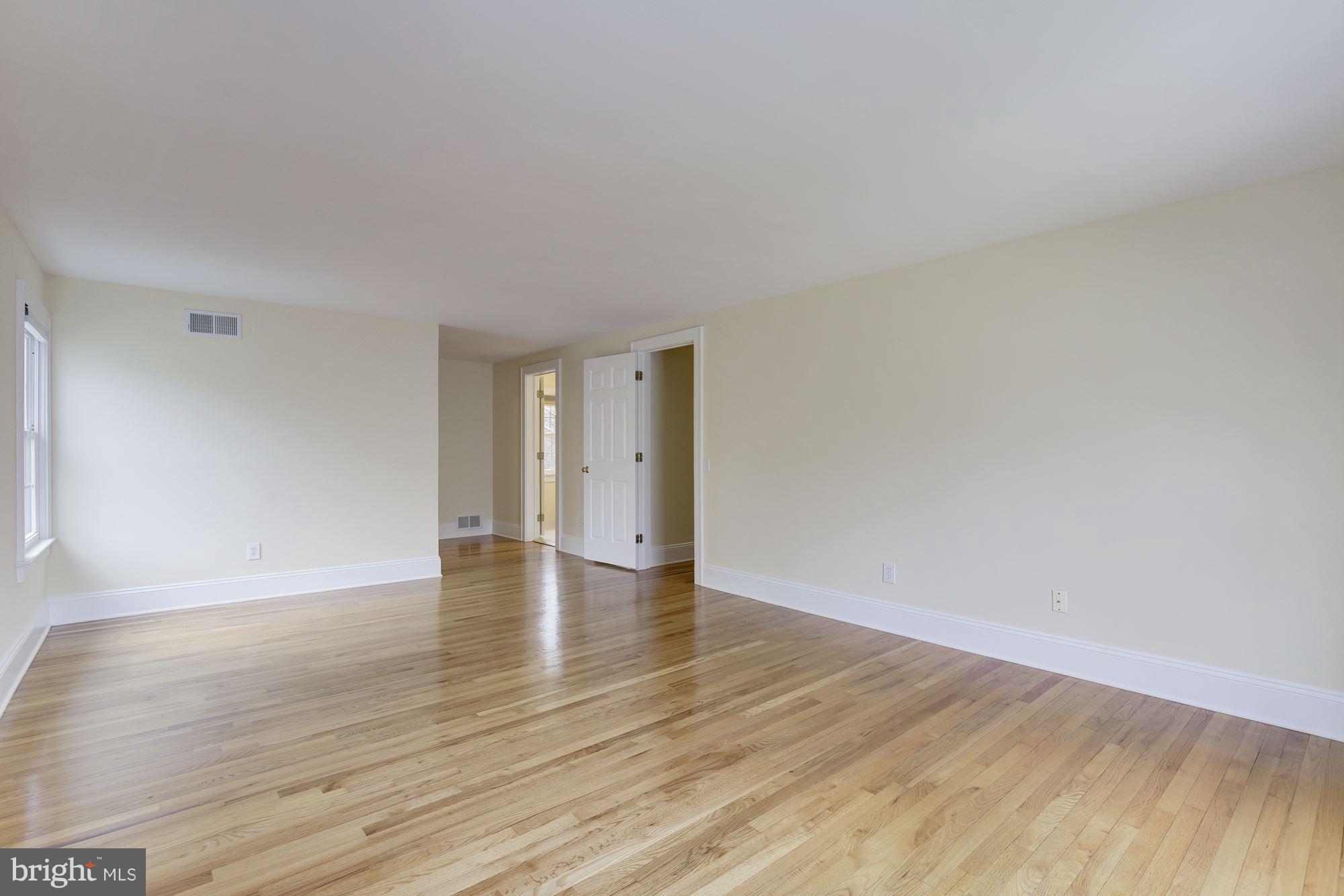 8524 Fox Run Potomac, MD 20854 - Photo 17 of 30 a view of an empty room and wooden floor