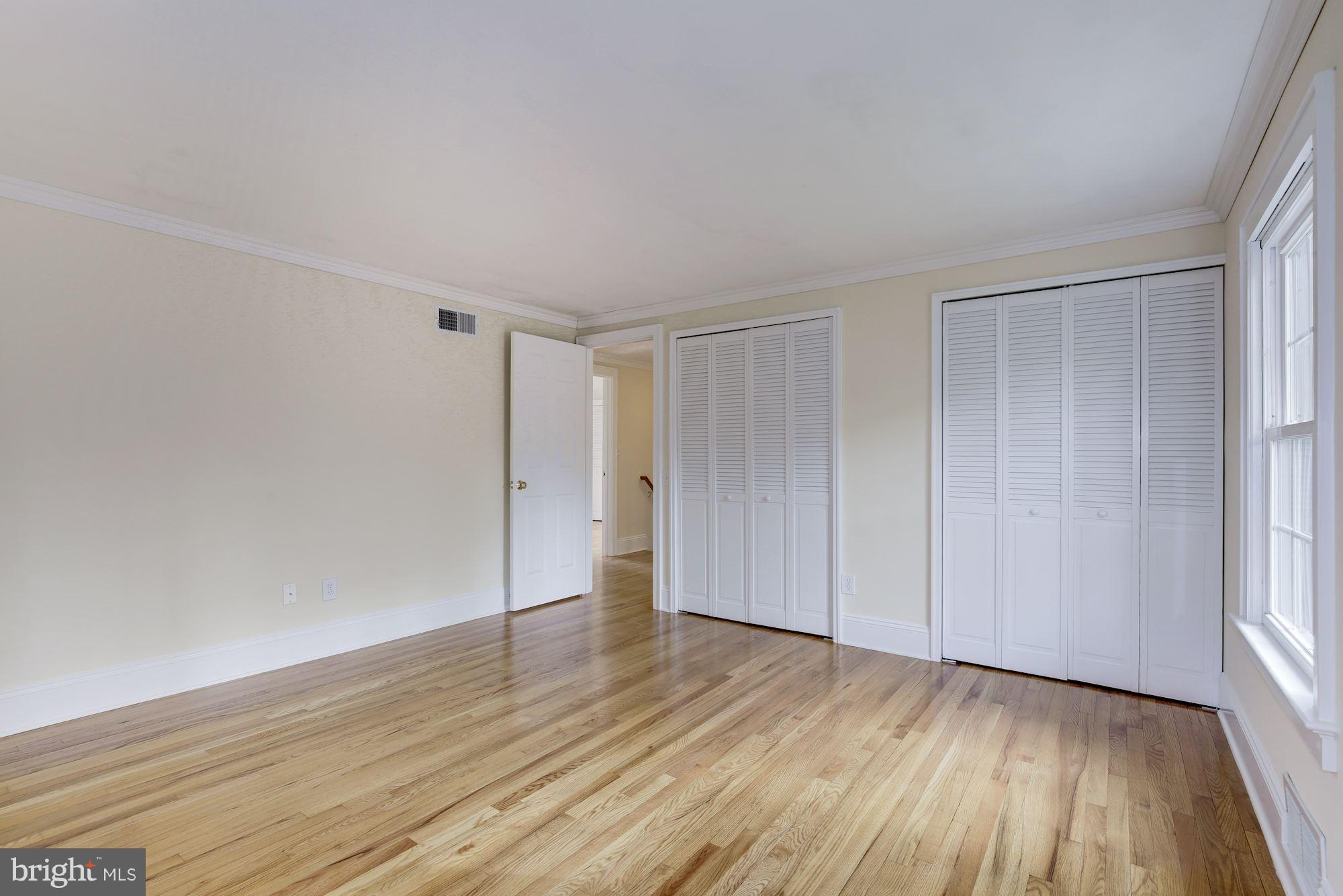 8524 Fox Run Potomac, MD 20854 - Photo 20 of 30 a view of an empty room and wooden floor