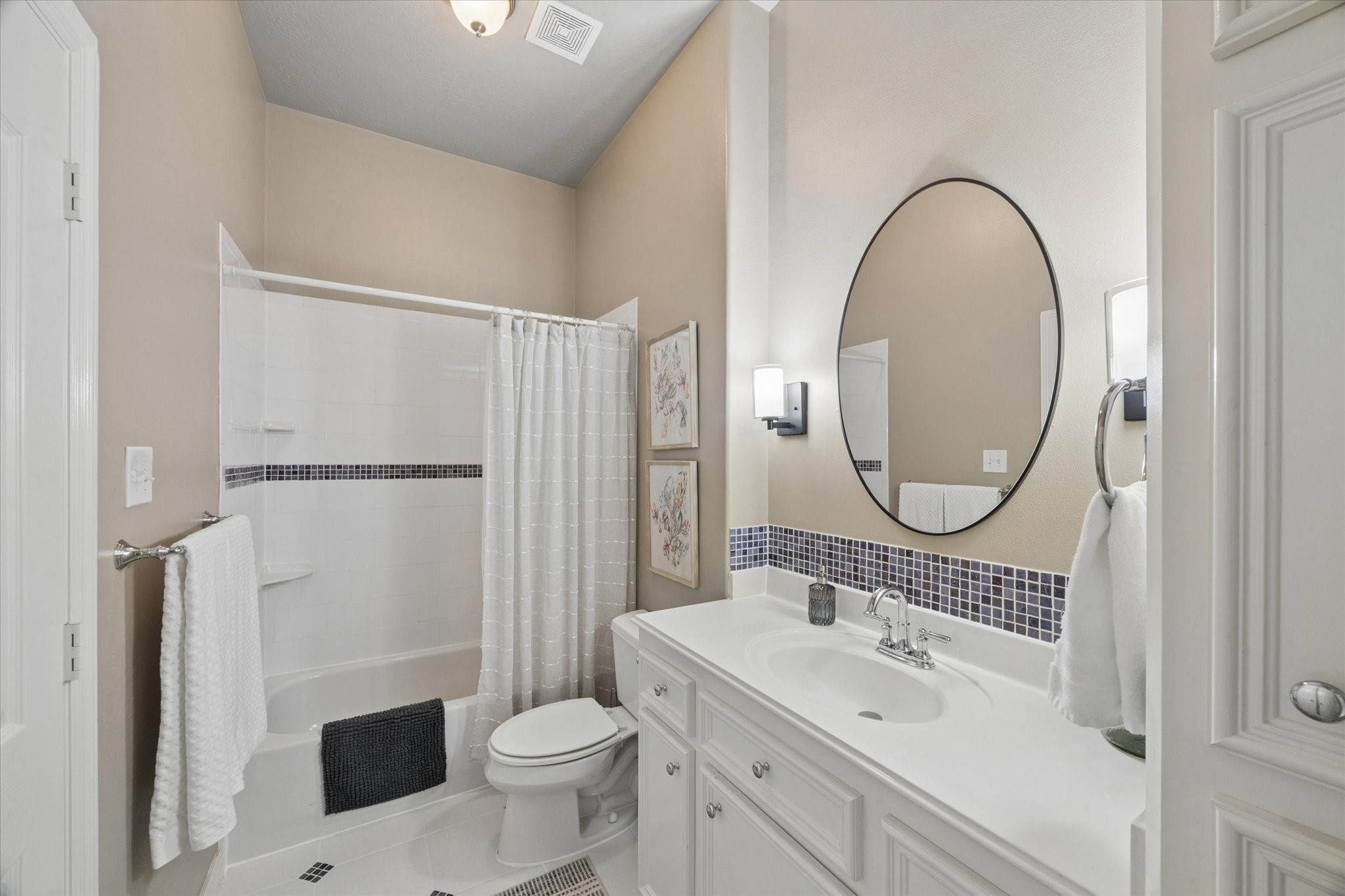 16519 Deerhaven Run Rosharon, TX 77583 - Photo 19 of 47 a bathroom with a sink a toilet and a mirror