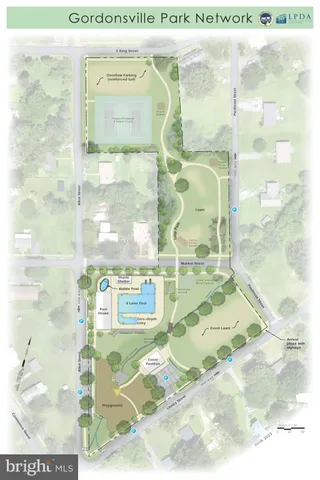 a view of a building with sitting area