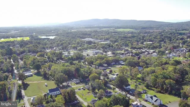 an aerial view of residential house and outdoor space