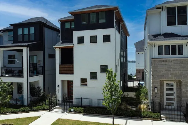a front view of a house with yard