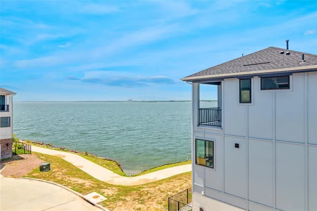 a backyard of a house with yard and staircase