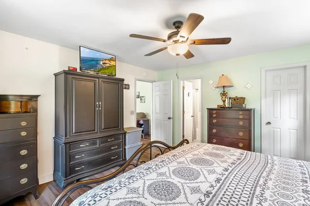 a room with furniture and a floor to ceiling window