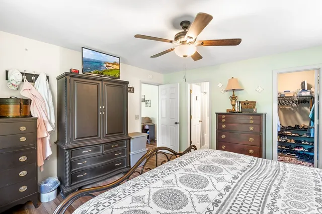 a balcony with furniture and wooden floor