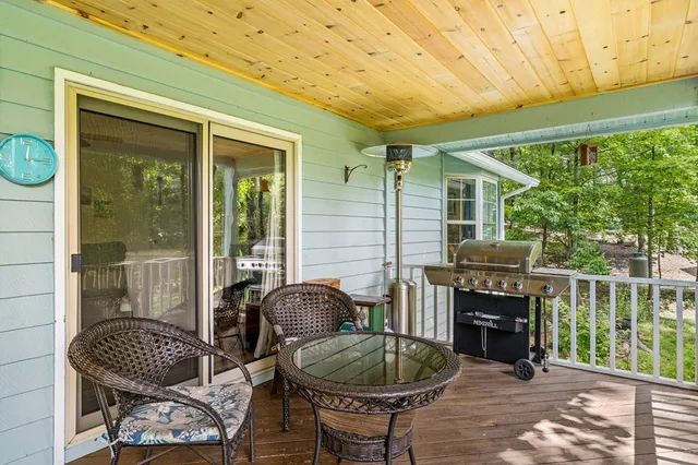 a bathroom with a bathtub and a shower curtain