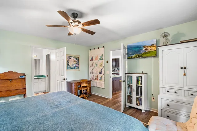 a kitchen with granite countertop stainless steel appliances and wooden cabinets