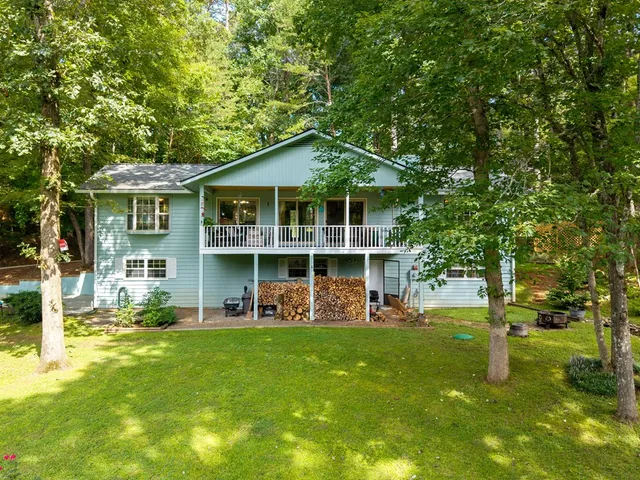 a view of living room with a table and chair