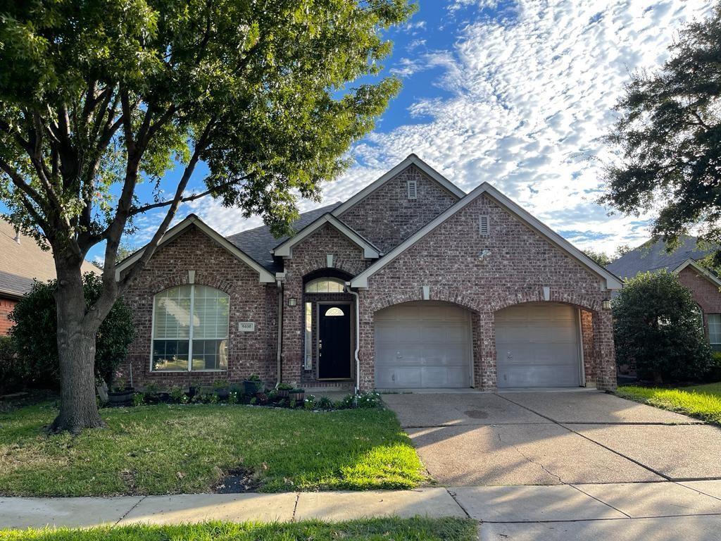 9400 Western Trail Irving, TX 75063 - Photo 1 of 24 a front view of a house with a garden