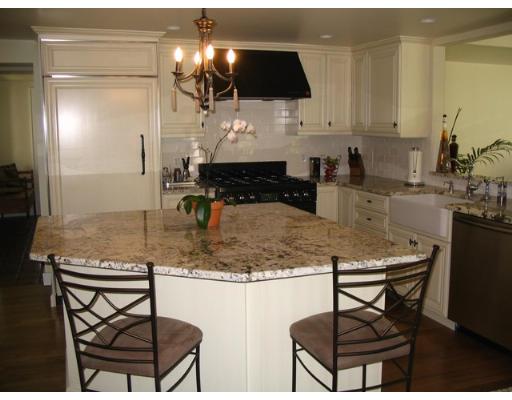29 Jefferson Road Wellesley, MA 02481 - Photo 3 of 14 a kitchen with a table and chairs in it