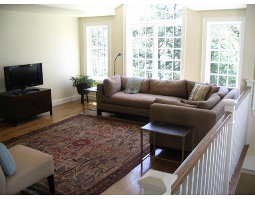 29 Jefferson Road Wellesley, MA 02481 - Photo 4 of 14 a living room with furniture and a flat screen tv