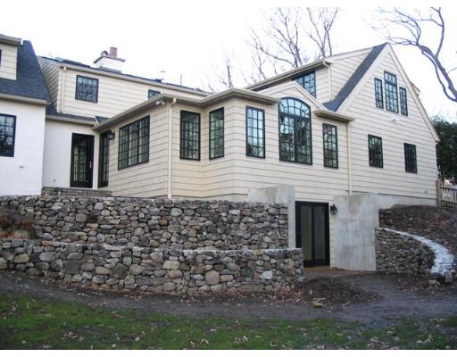 29 Jefferson Road Wellesley, MA 02481 - Photo 6 of 14 a view of a white house with a outdoor space