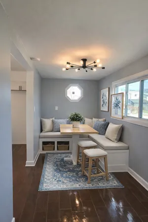 a view of a kitchen area with furniture and window