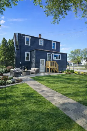 a front view of house with outdoor space and yard