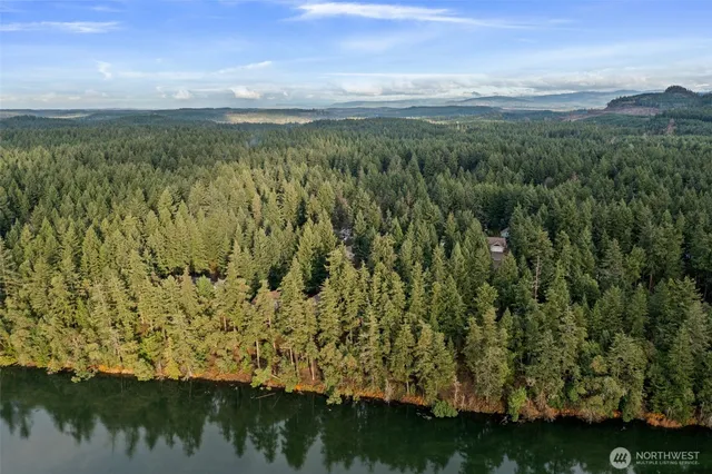 a view of lake with green space