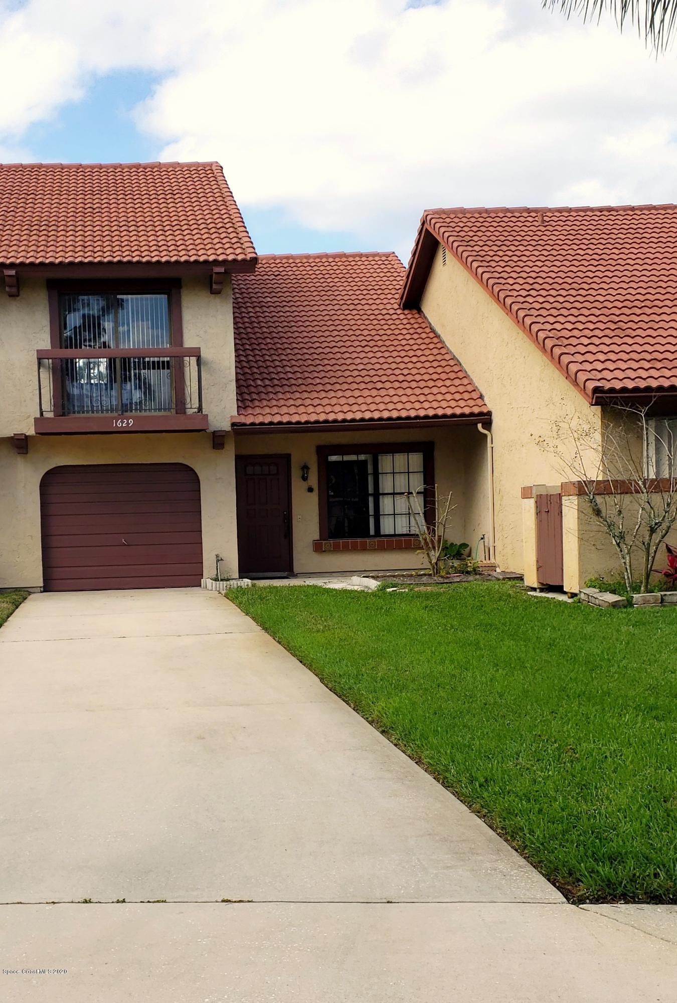 1629 Avery Road Northeast Palm Bay, FL 32905 - Photo 1 of 24 1. Front of Residence