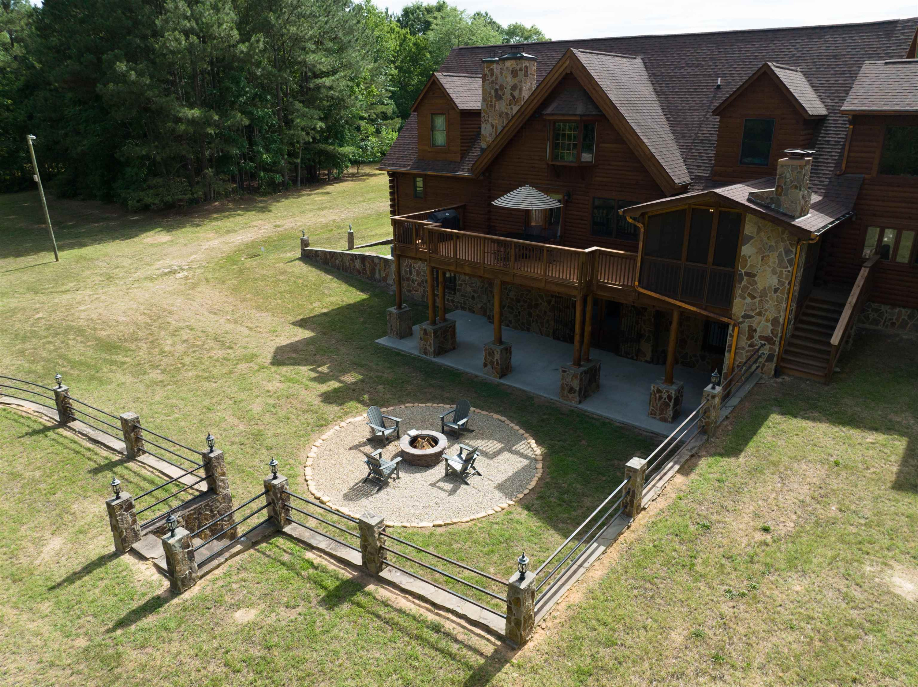 1039 North Chavis Road Kittrell, NC 27544 - Photo 13 of 53 a view of a swimming pool with a patio