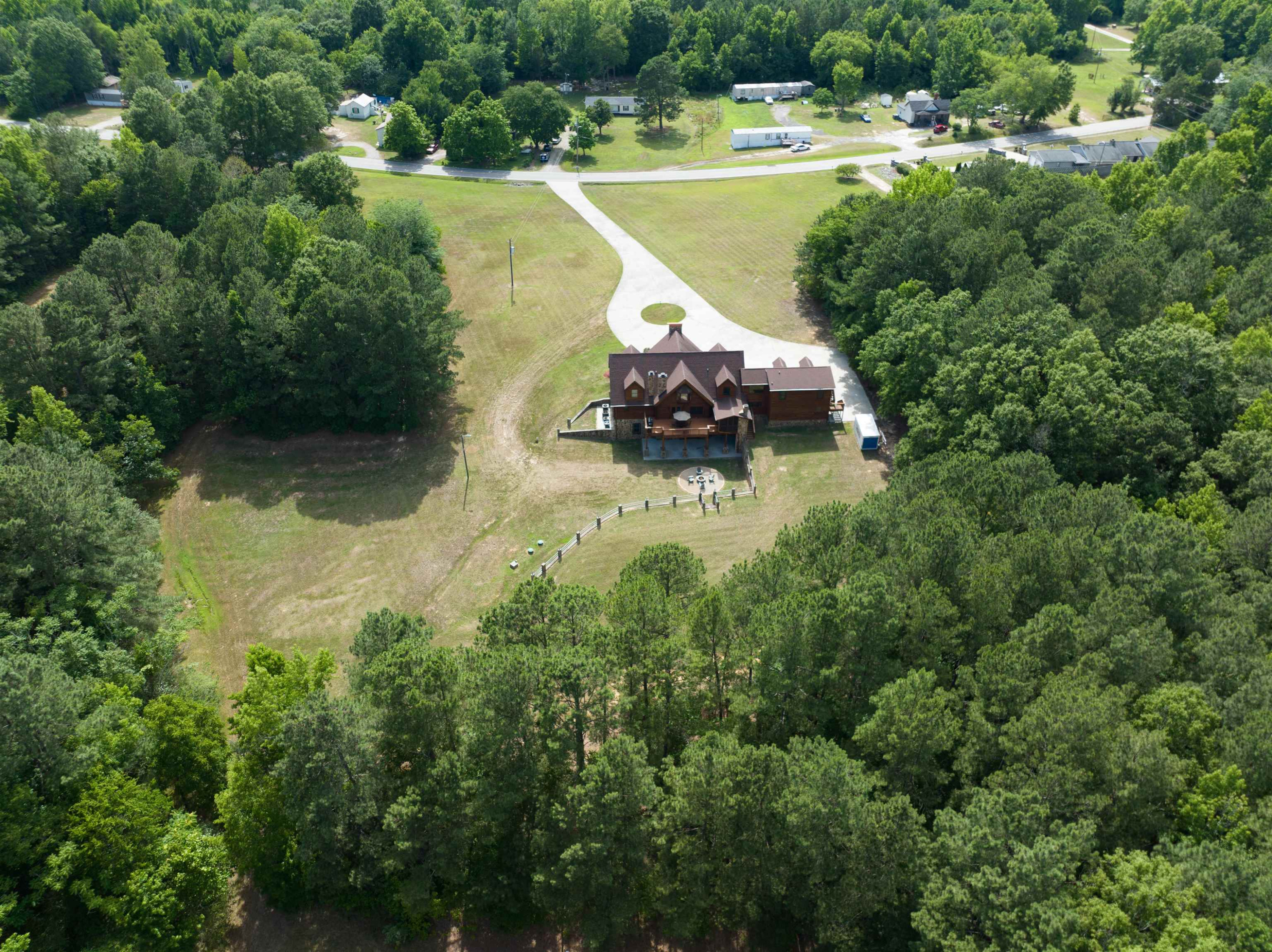 1039 North Chavis Road Kittrell, NC 27544 - Photo 14 of 53 an aerial view of a house with a yard and lake view