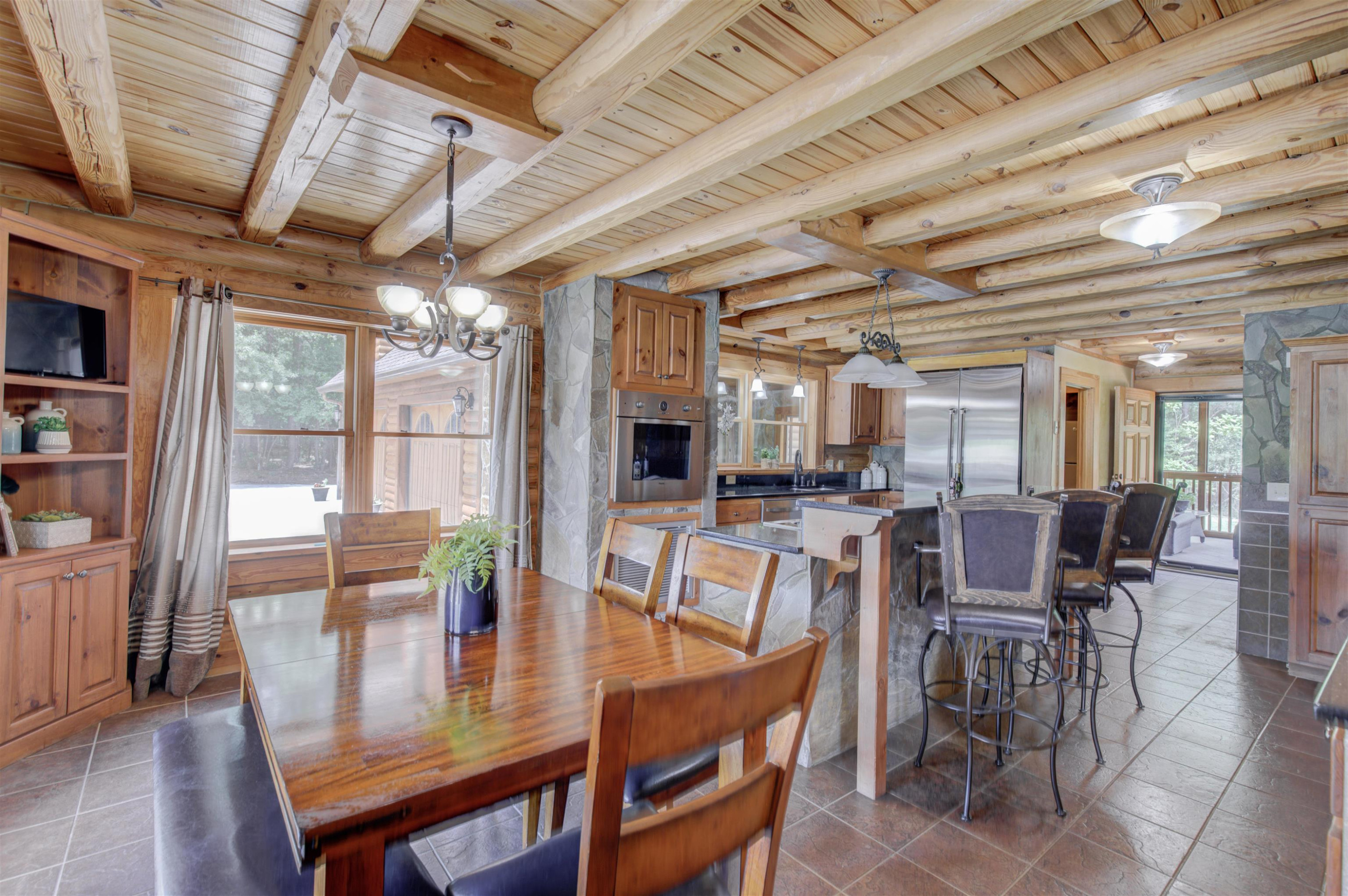 1039 North Chavis Road Kittrell, NC 27544 - Photo 18 of 53 a view of a dining room with furniture window and outside view