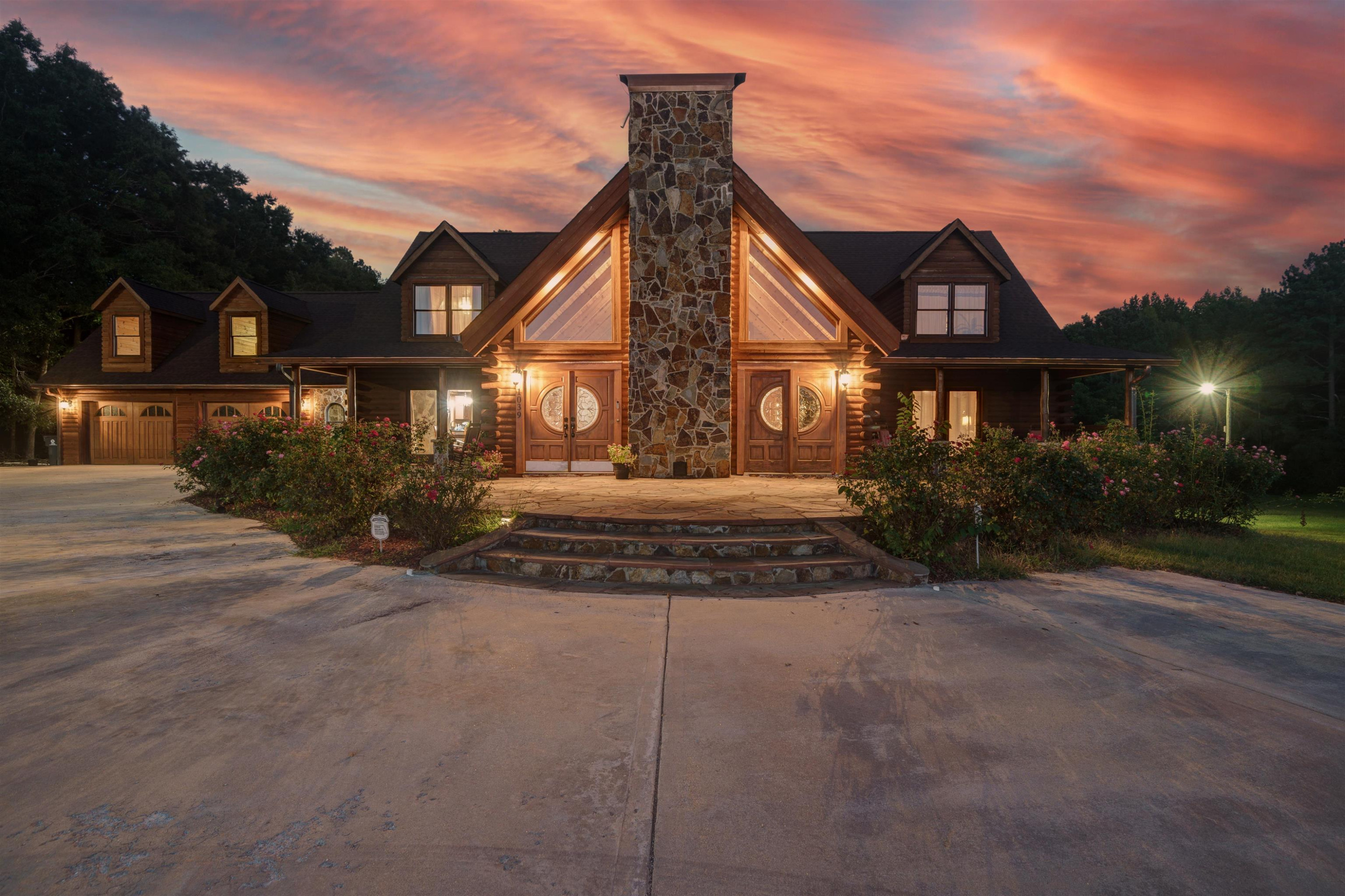 1039 North Chavis Road Kittrell, NC 27544 - Photo 2 of 53 a front view of a house with a yard