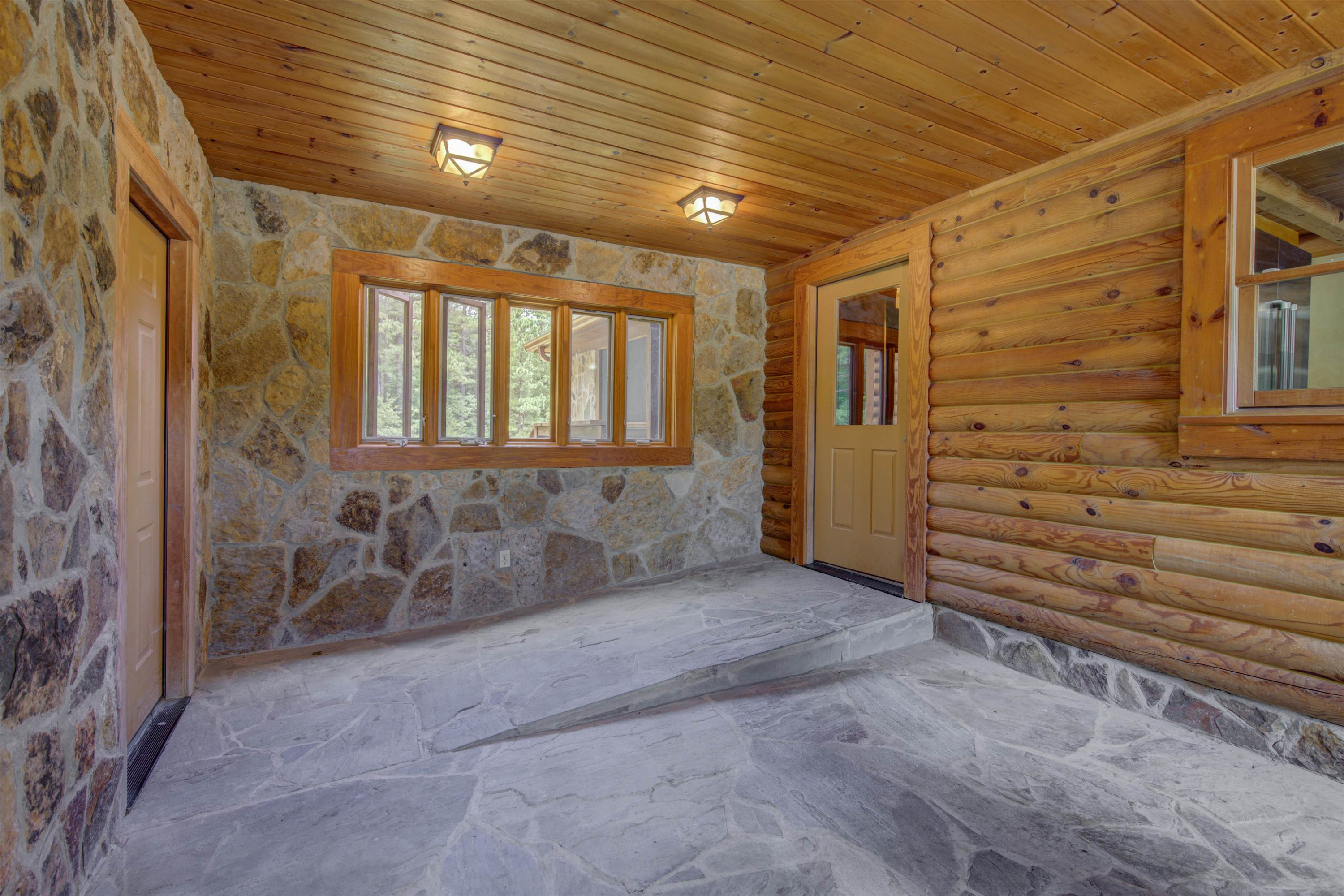 1039 North Chavis Road Kittrell, NC 27544 - Photo 22 of 53 a view of an empty room with a window