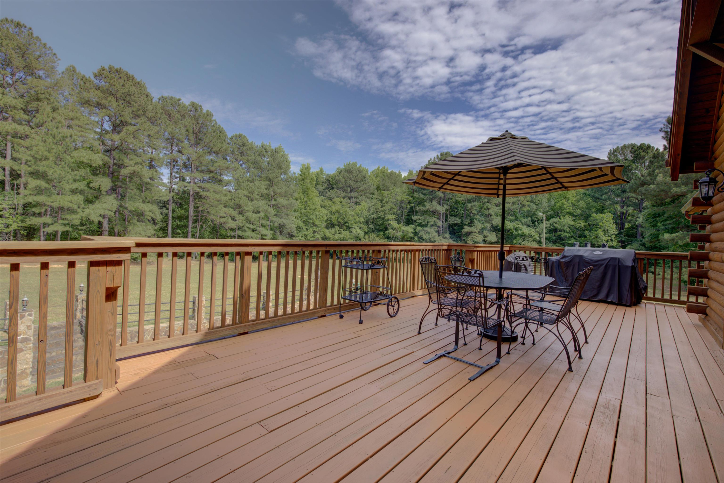 1039 North Chavis Road Kittrell, NC 27544 - Photo 43 of 53 a view of balcony with outdoor seating and wooden floor